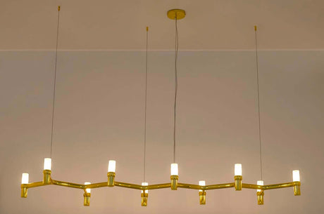 Závesná lampa Atomic Long v zlatej farbe