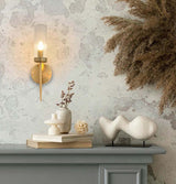 5. Zlatá nástenná lampa Torch