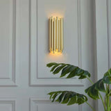 7. Nástenná lampa Tubo zlatá